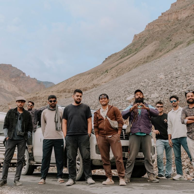 A group of friends on a road trip in the mountains